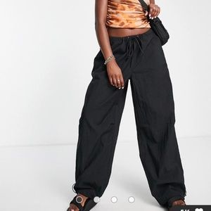 Topshop oversized balloon nylon parachute pants in black